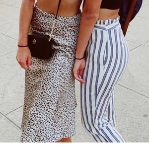 Princess Polly animal print silky skirt.